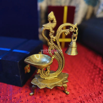 PITTALAM Brass Peacock Diya - Festive Radiance