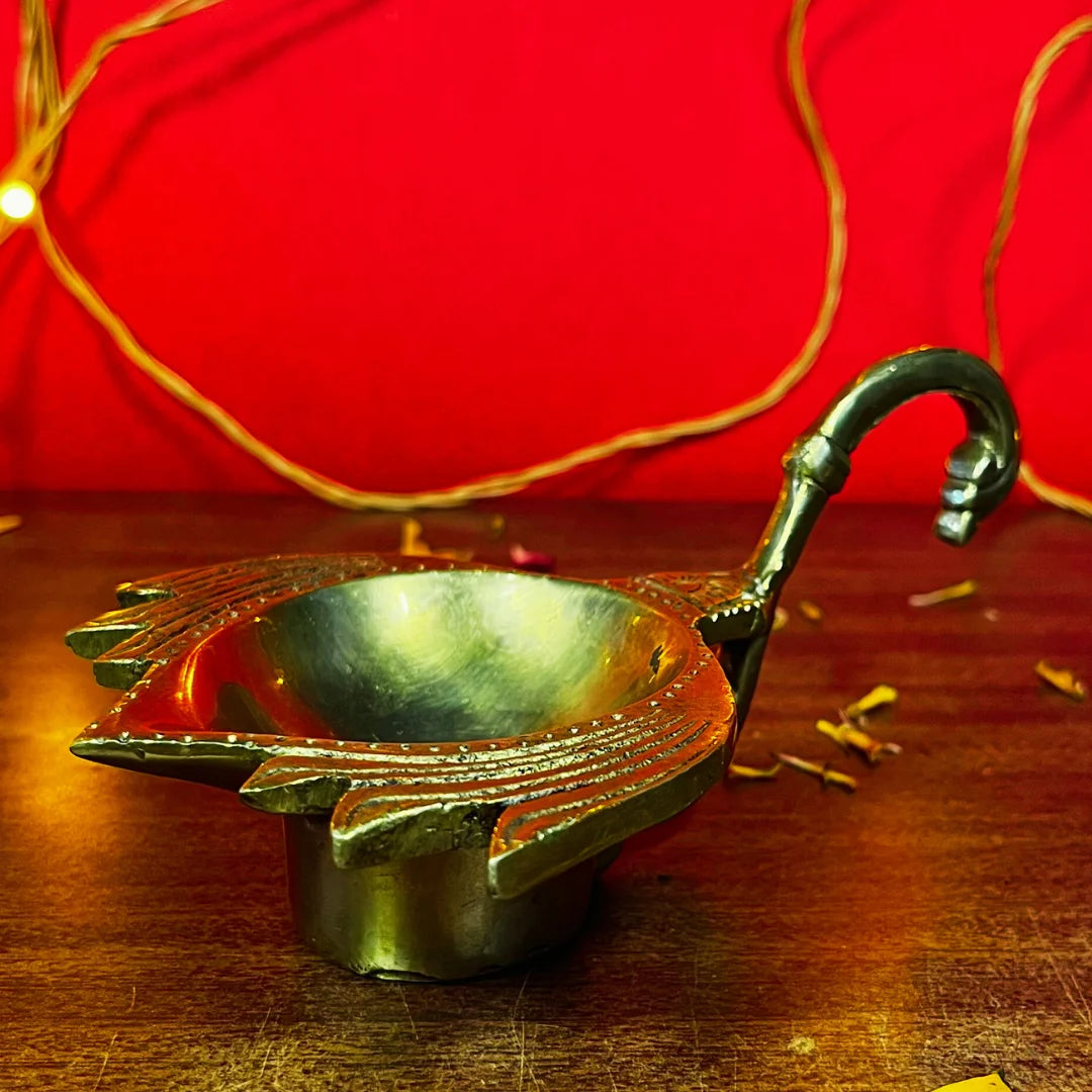 PITTALAM Brass Lotus Aarti Diya with Handle - Subtle Radiance